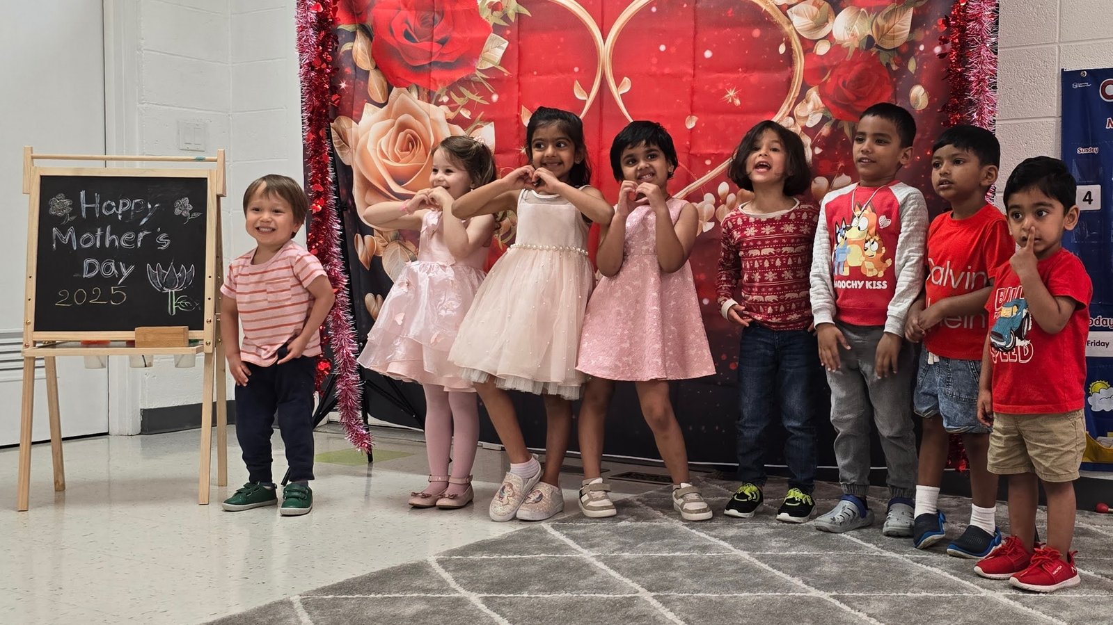 Children singing and performing at school celebration