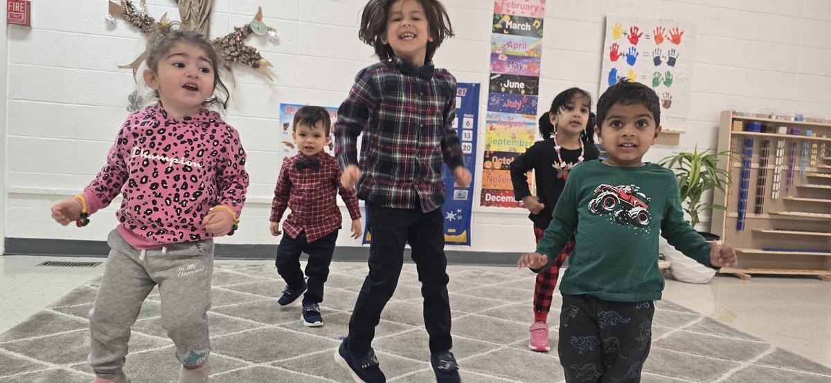 Children and families enjoying winter celebrations at Milestones