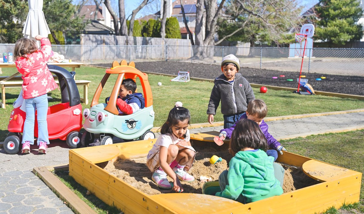 Children engaged in hands-on Montessori learning activity