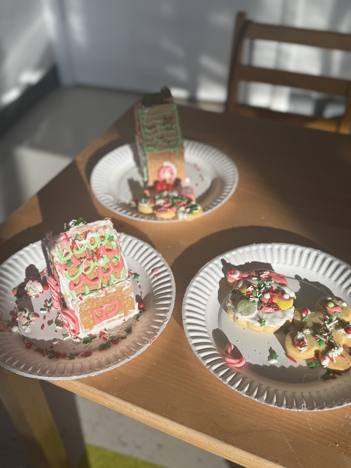 Children creating festive holiday art at Milestones