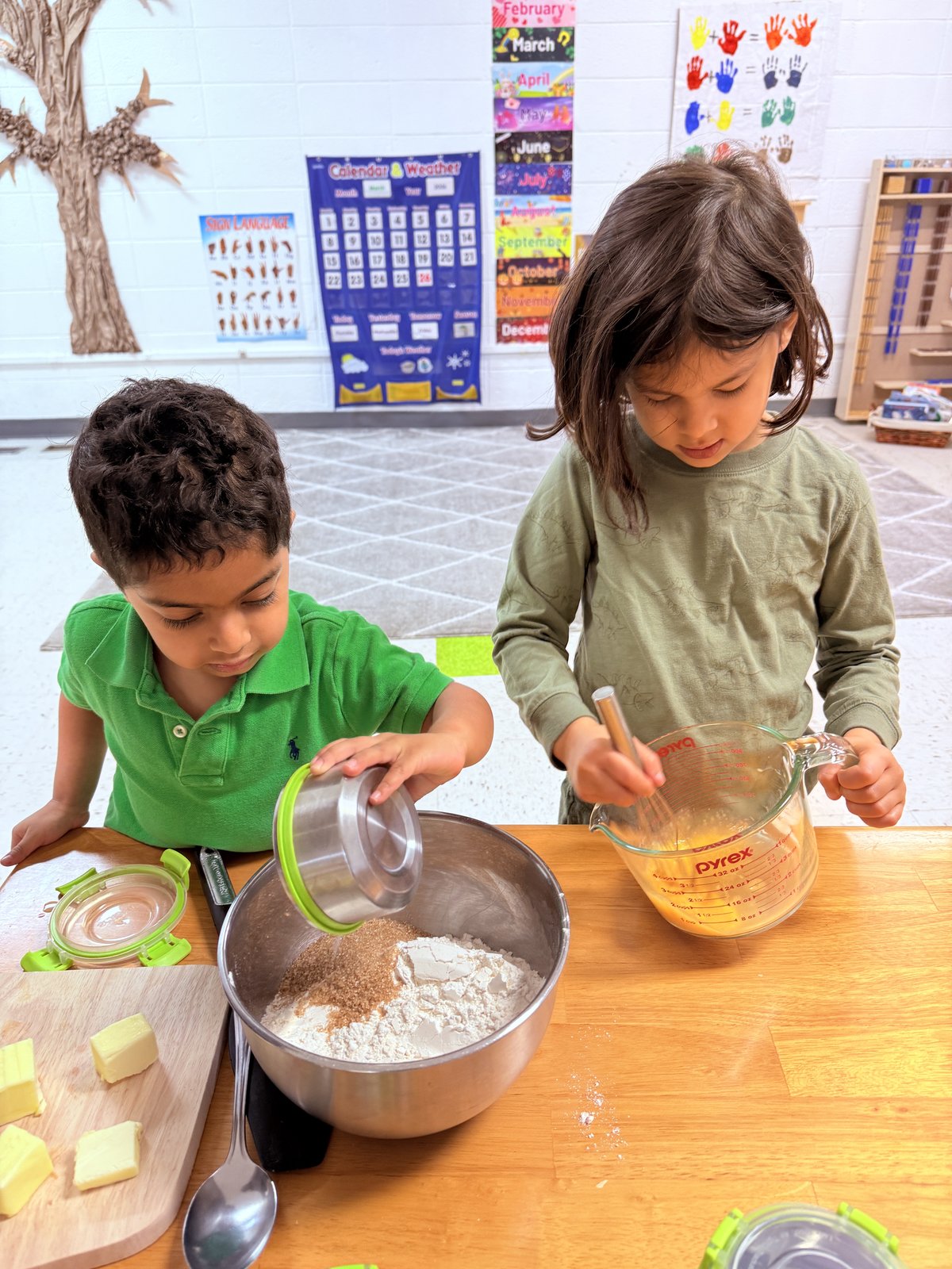 Student working on a detailed Montessori art project